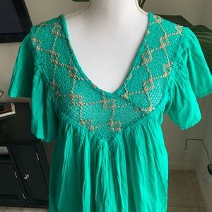 Green with gold embroidered tunic dress.